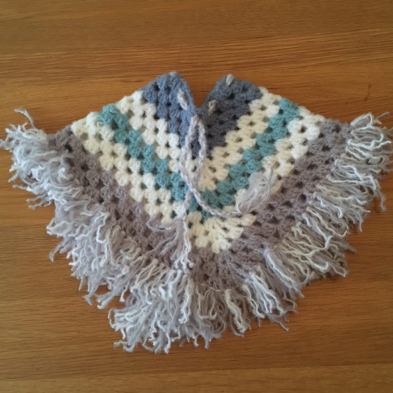 11 een poncho
